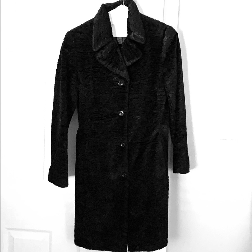 Grab this black long jacket from BEBE